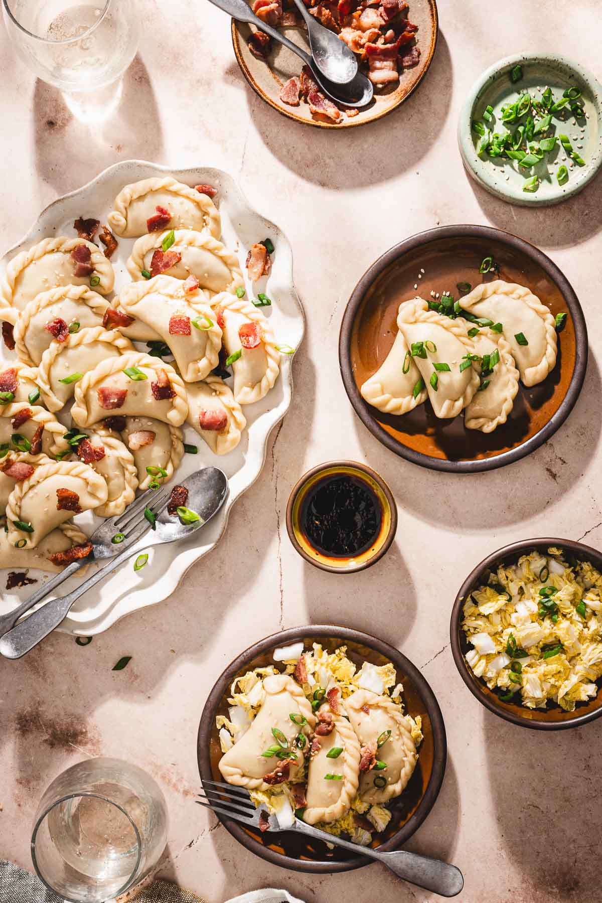 platter with pierogi, plates with pierogi