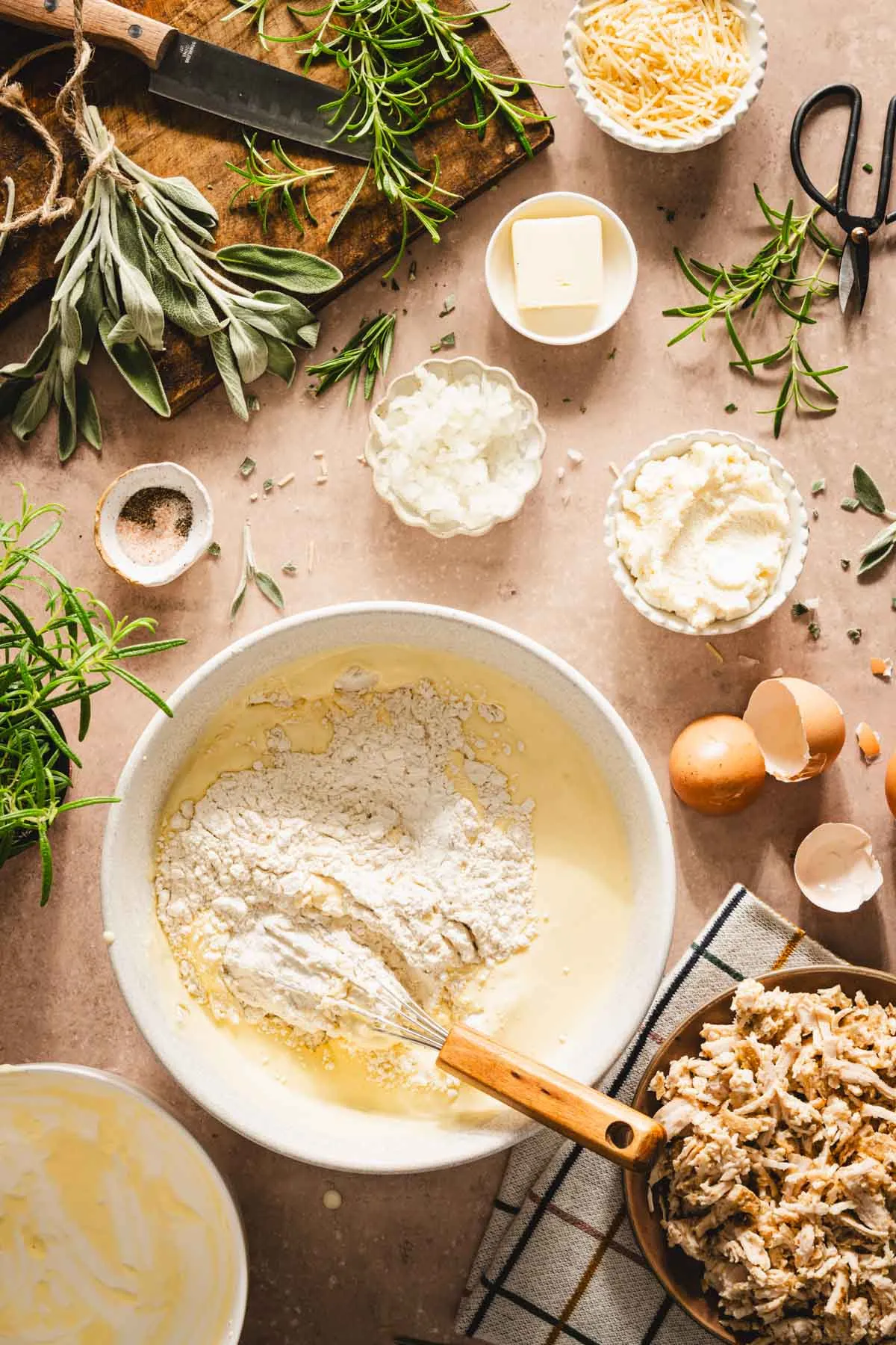 large mixing bowl with flour and wet ingredients