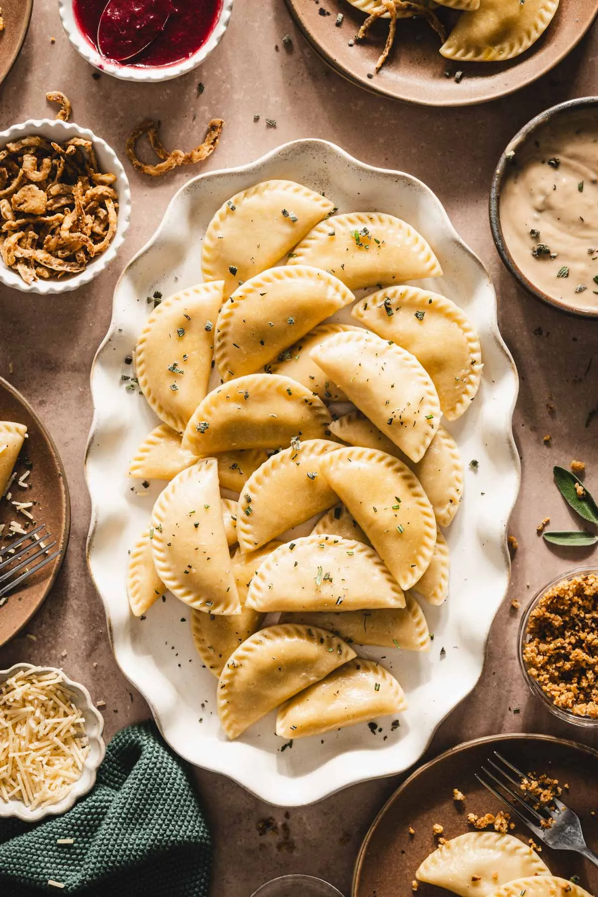 cooked pierogis on a serving platter