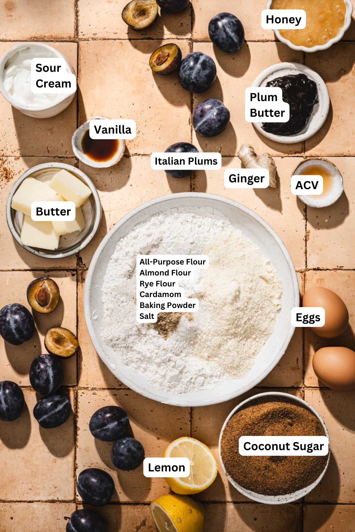 ingredients to make plum cake with name tags