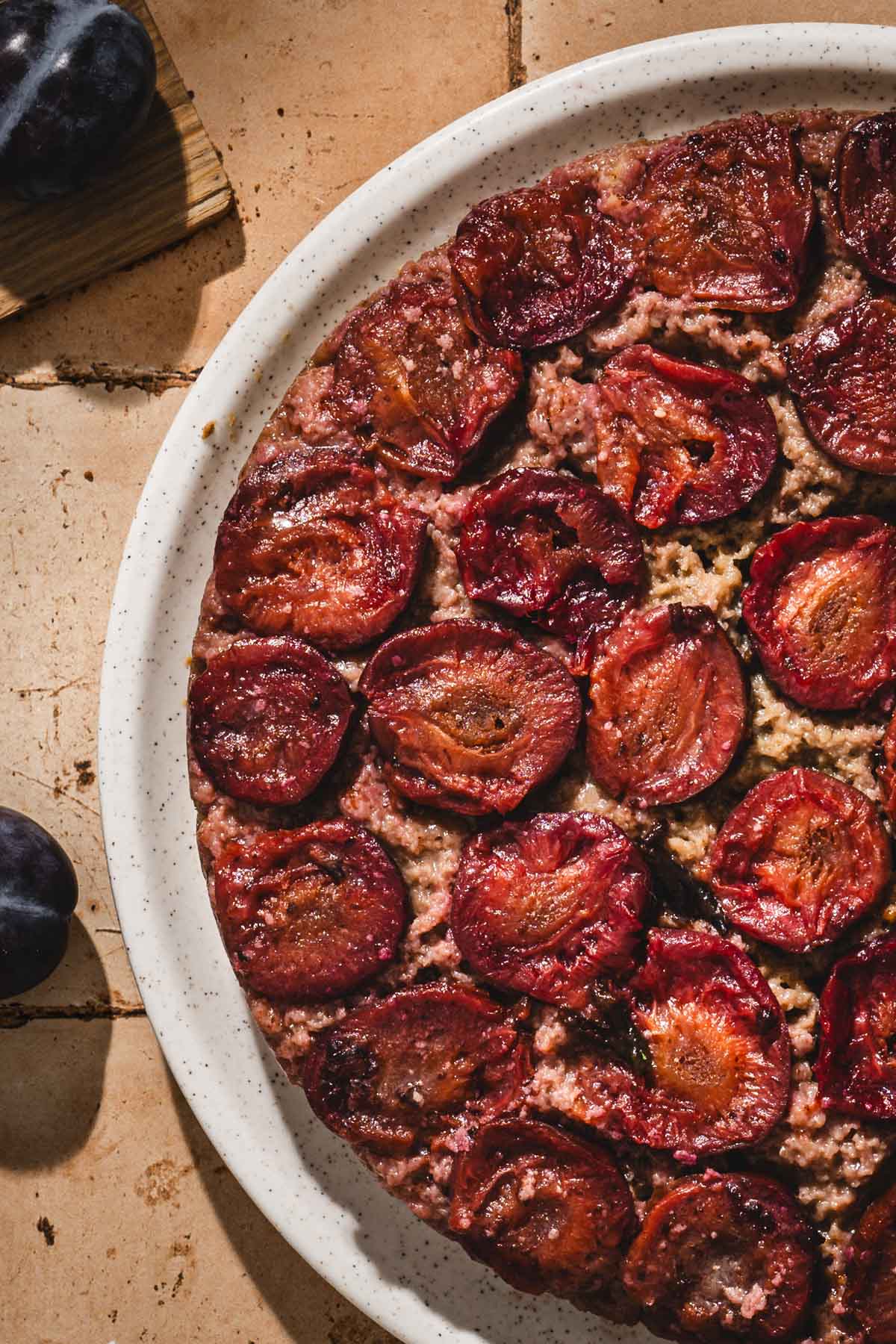 close up of the cake, plums