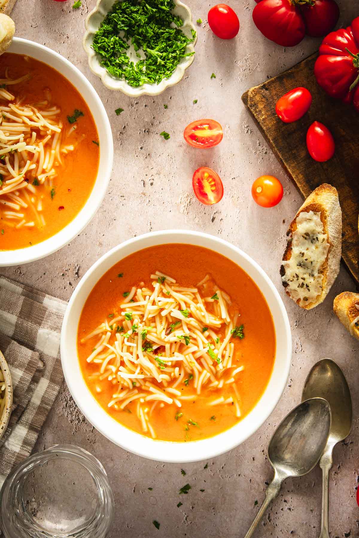 bowls with zupa pomidorowa, toast with cheese