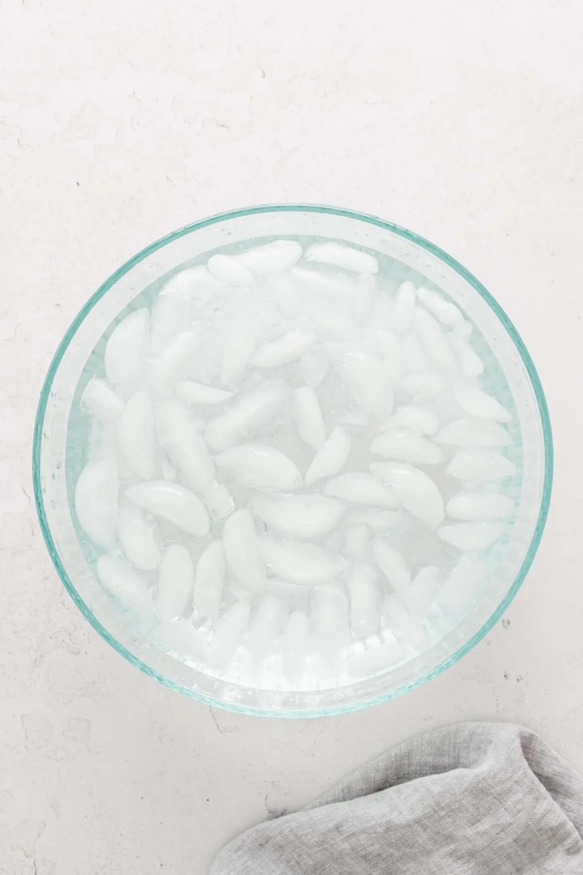large glass bowl with water and ice