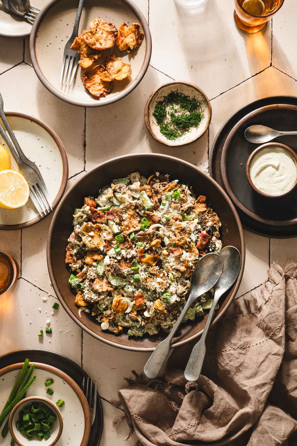 serving bowl with the salad,small plates around,