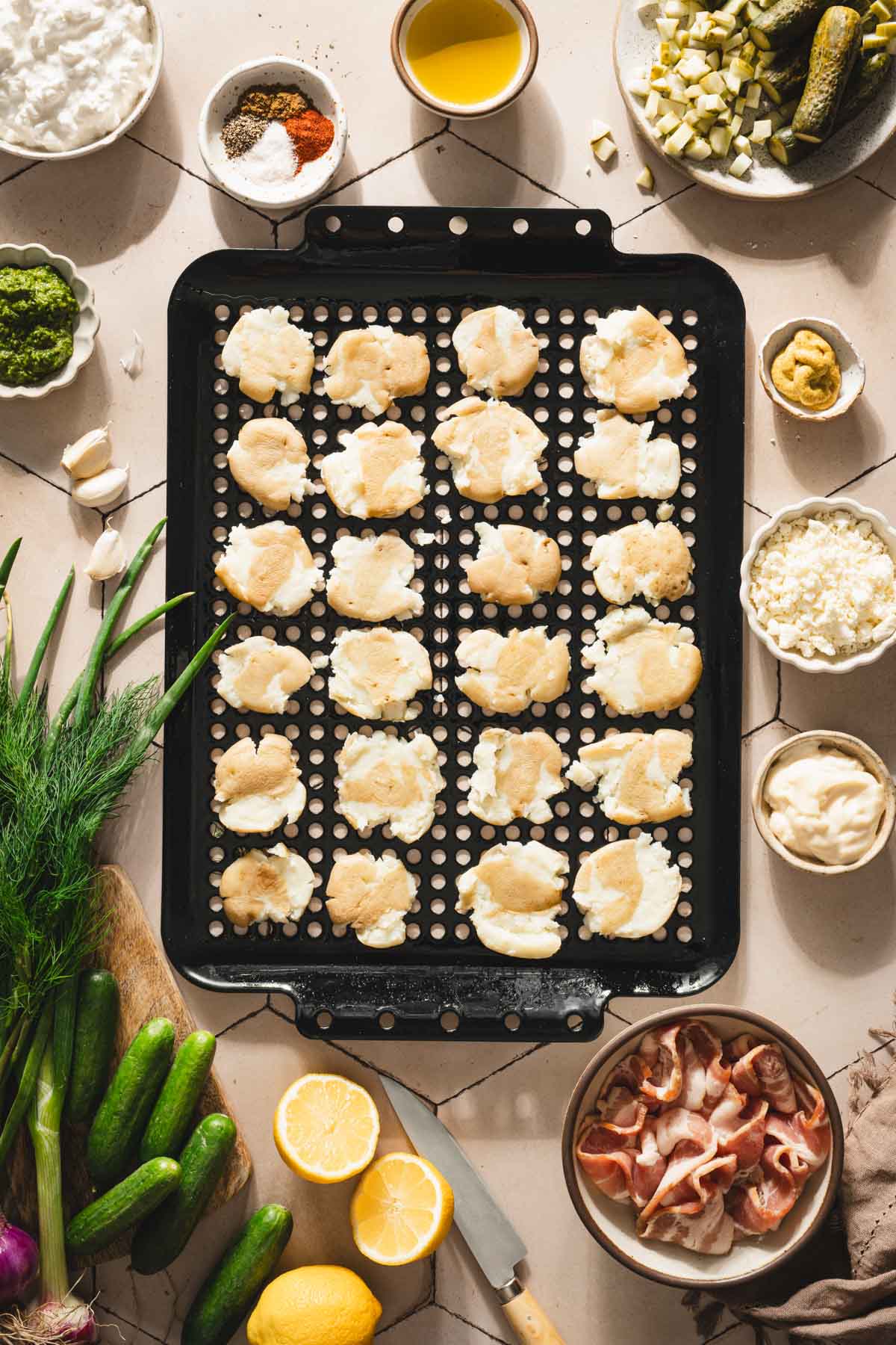 smashed potatoes on a baking tray