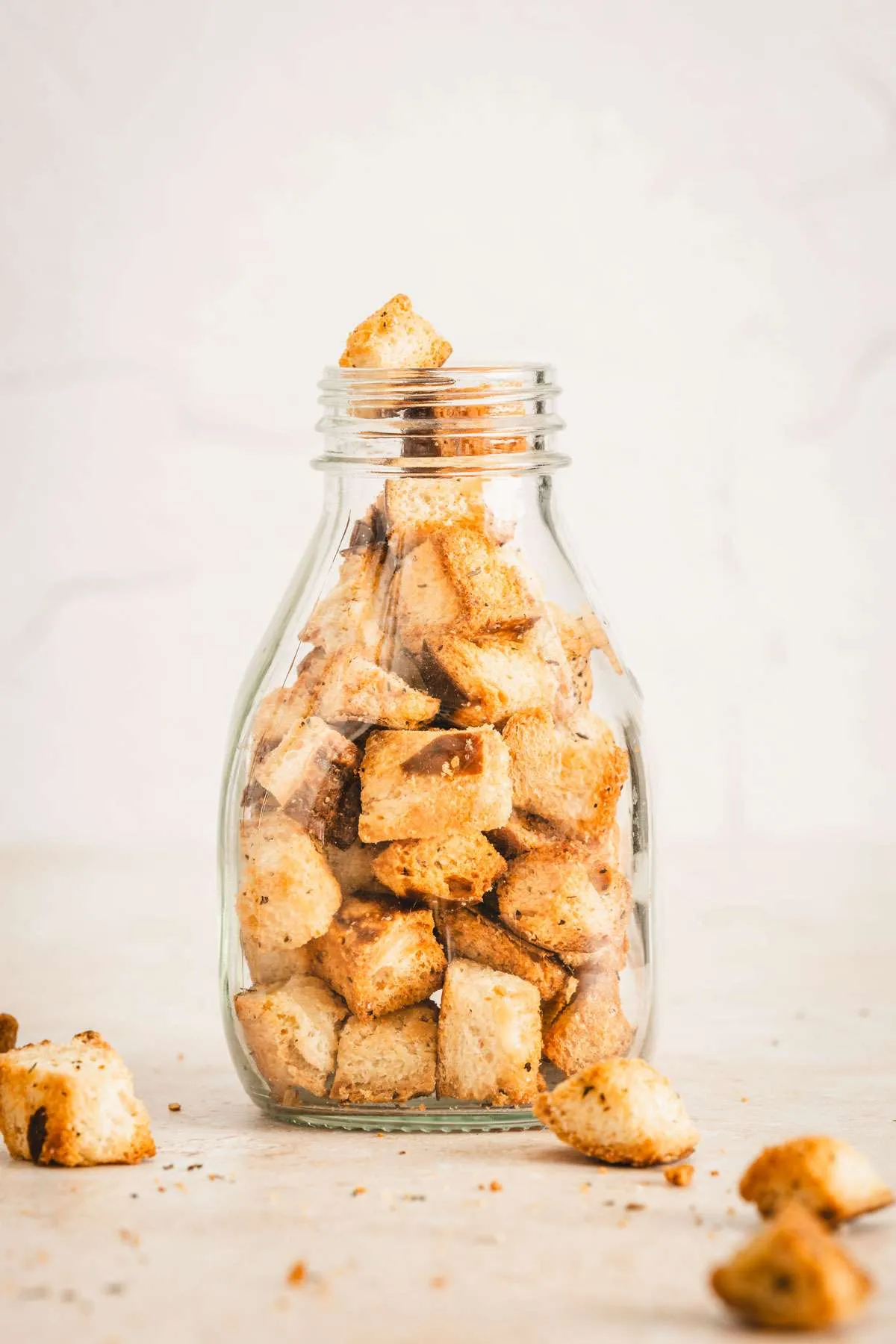 pretzel croutons in a glass bottle