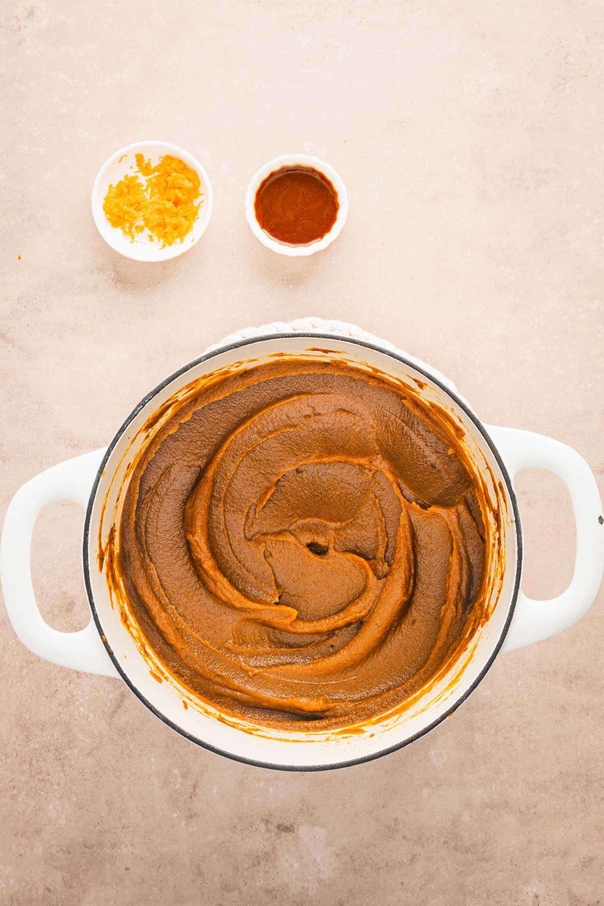 cast iron pot with pumpkin butter, side of orange zest adn vanilla