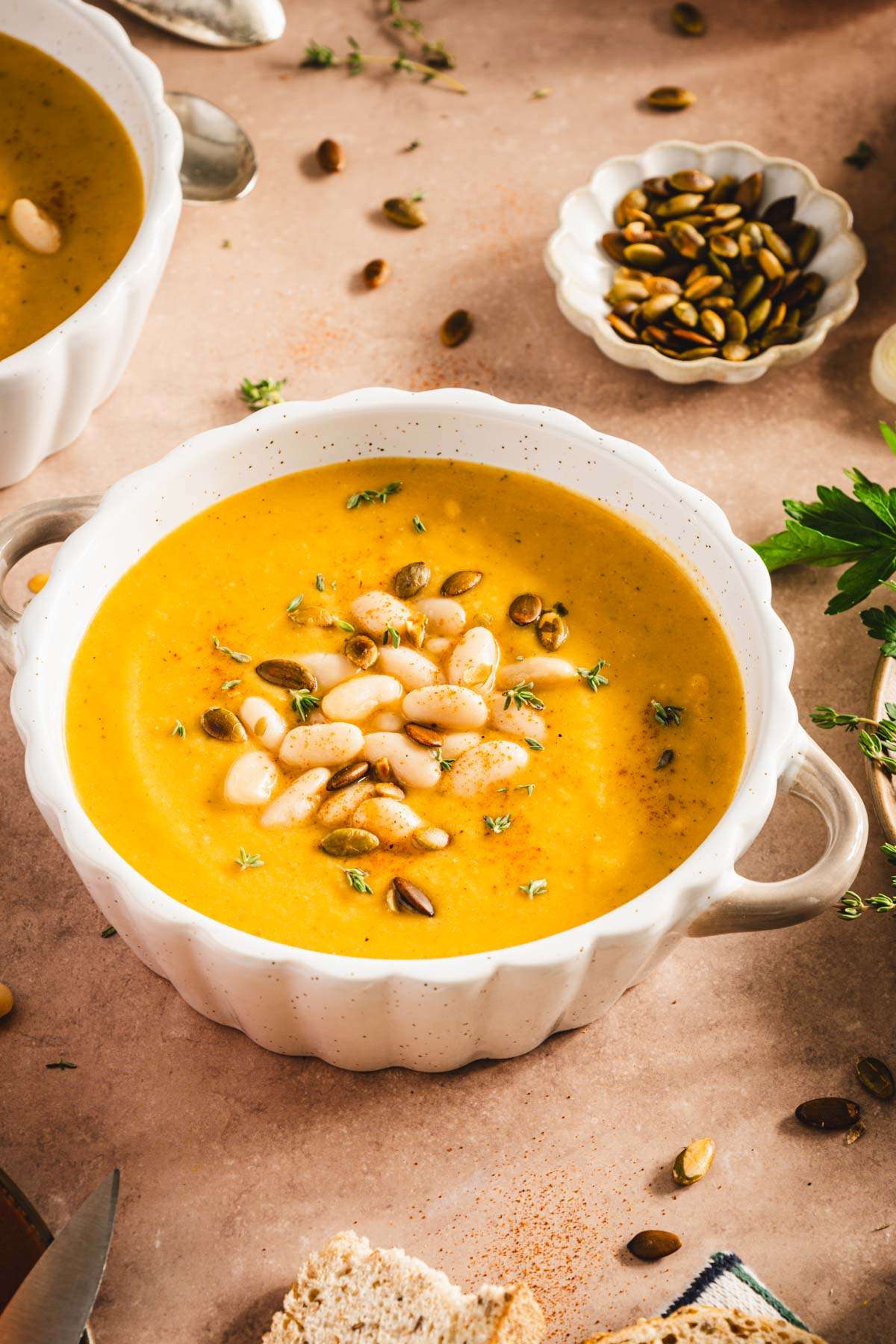 close up of bowl with pumpkin soup, 3/4 view