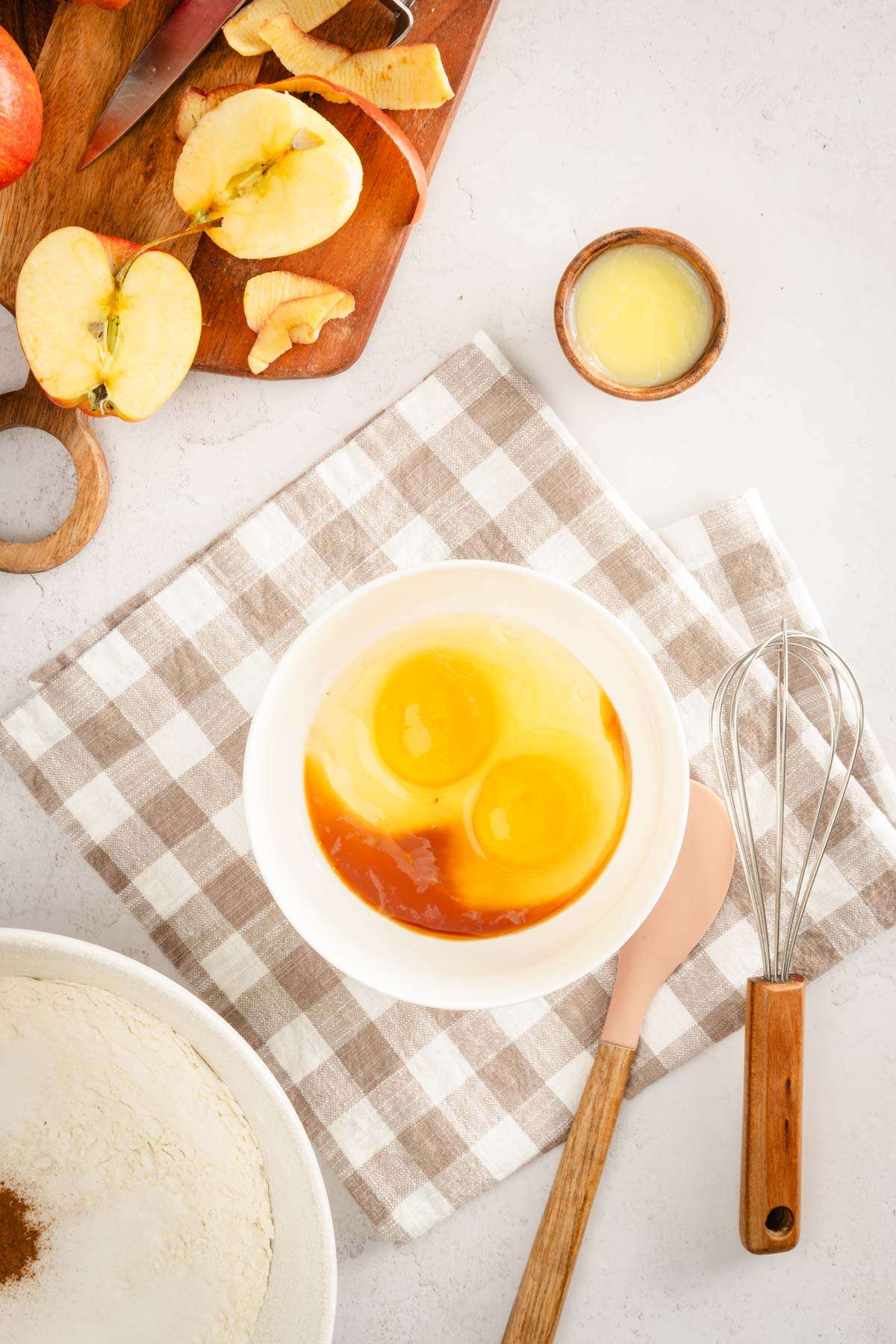 bowl with eggs, vanilla mixed in