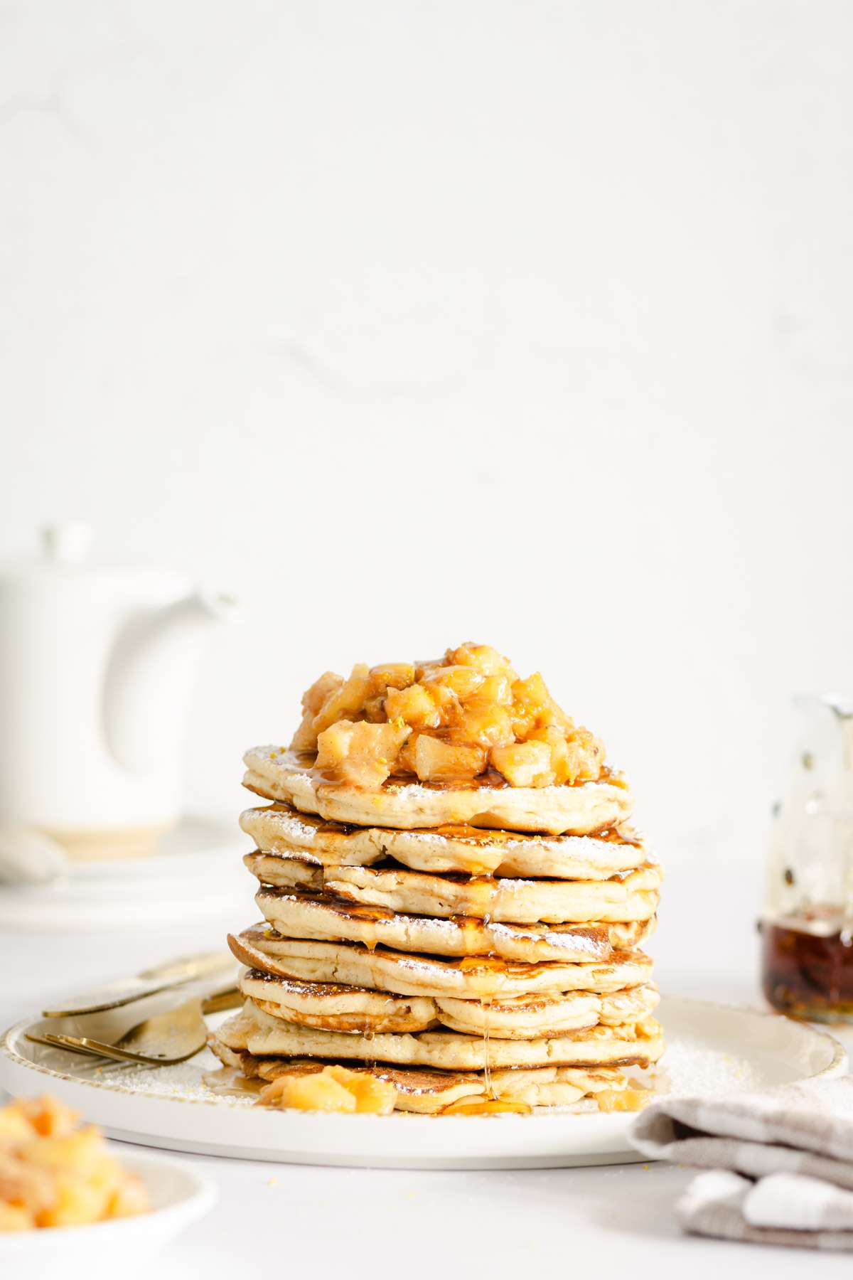 stack of racuchy with chopped apples on top