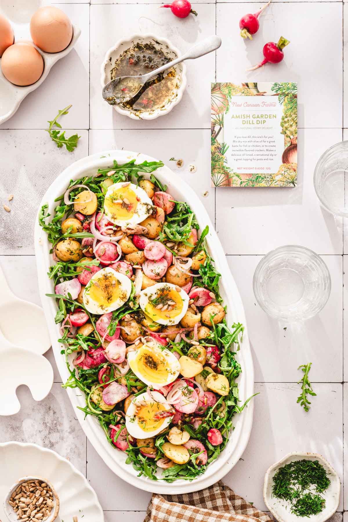 serving platter with the salad and brand package