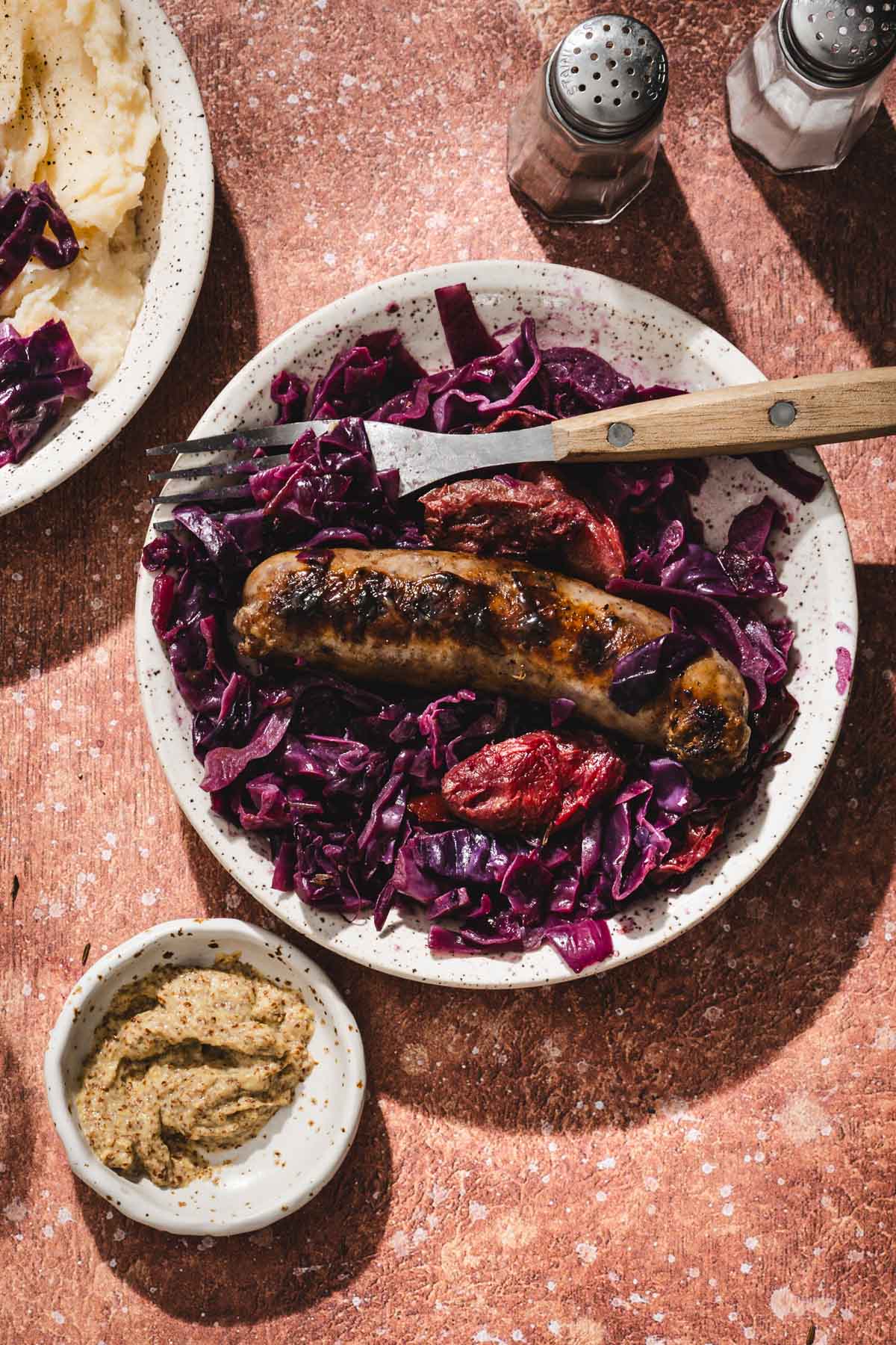 serving bowl with red cabbage and sausage