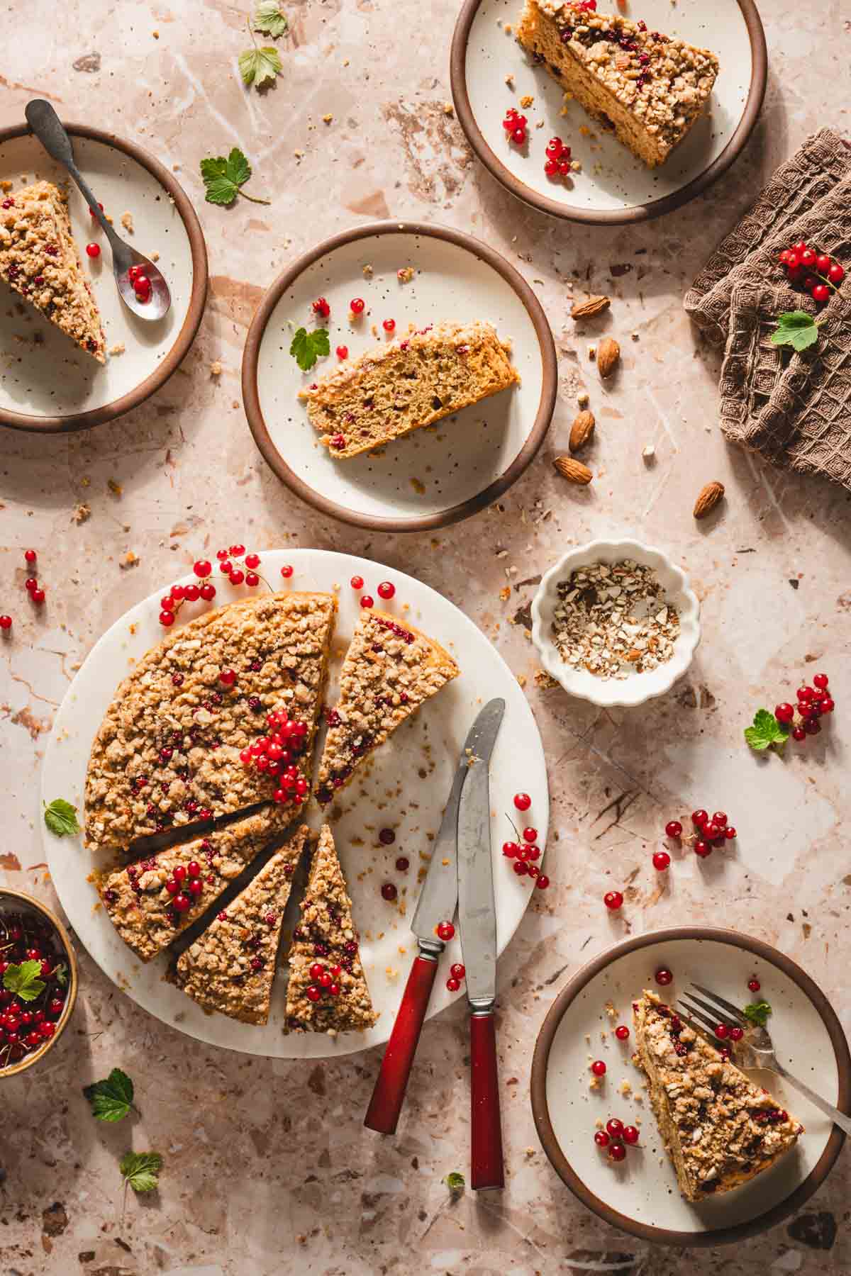 cake on a platter, plates iwth cake slices,