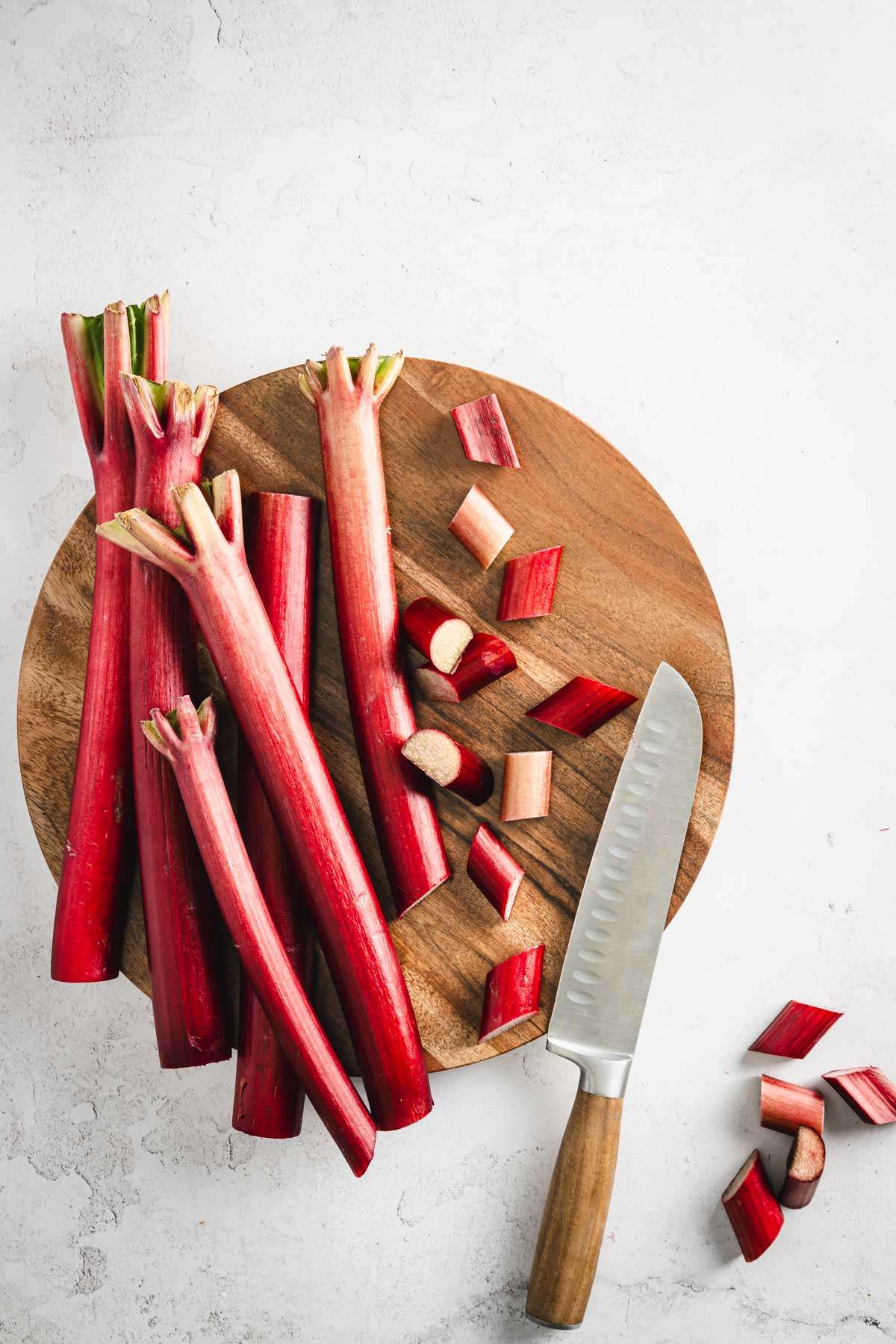 rhubarb on a cutting board, knife