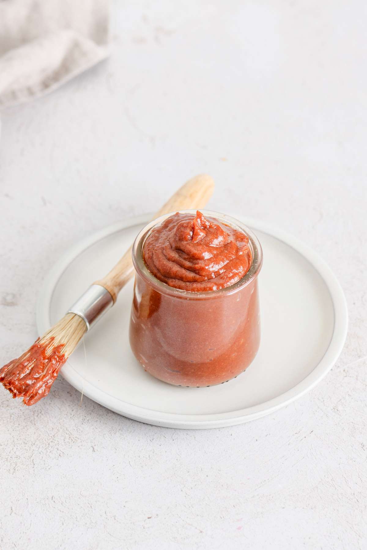 rhubarb BBQ sauce in a glass jar,