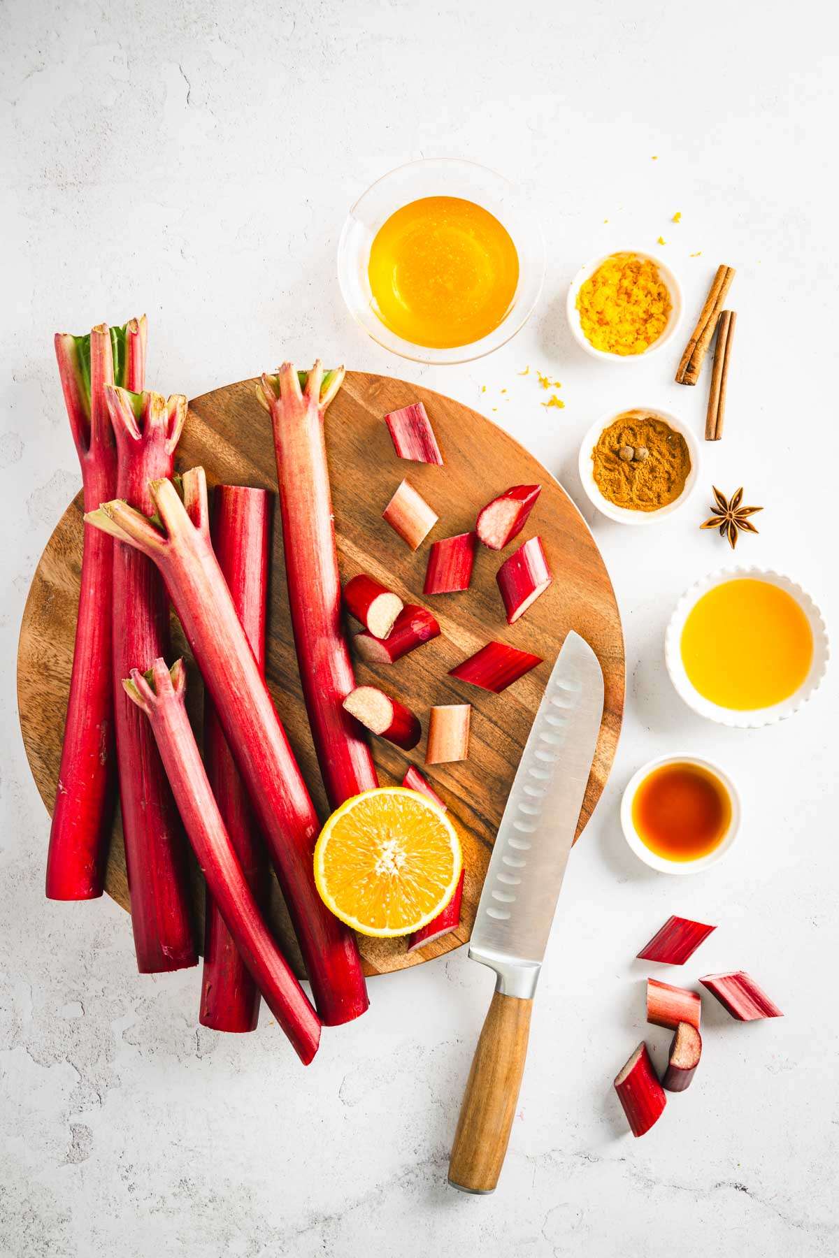 ingredients to make rhubarb butter, rhubarb on a cutting board