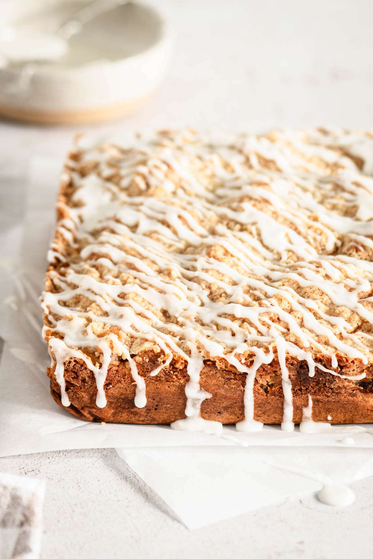 baked rhubarb cake, front view, drizzle of glaze