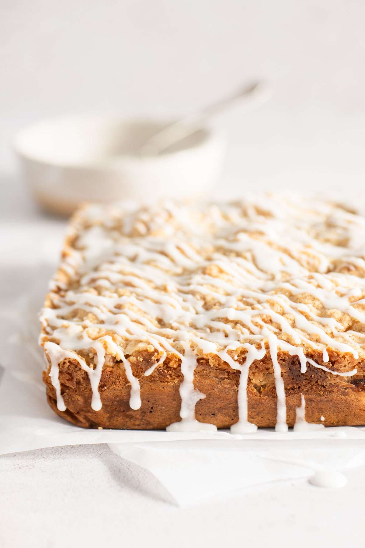 baked rhubarb cake, front view, drizzle of glaze