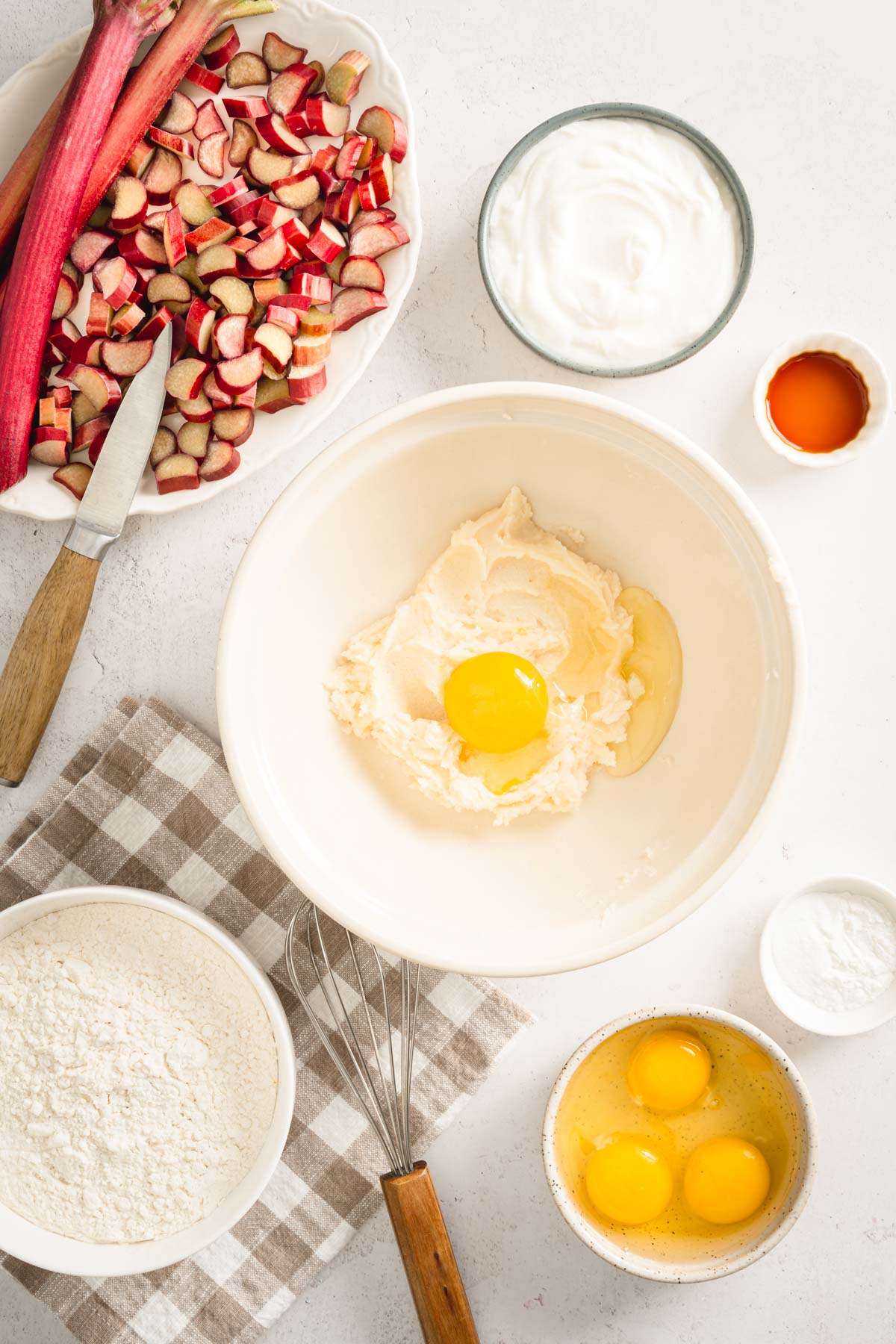 bowl with whipped sugar and butter , one egg added