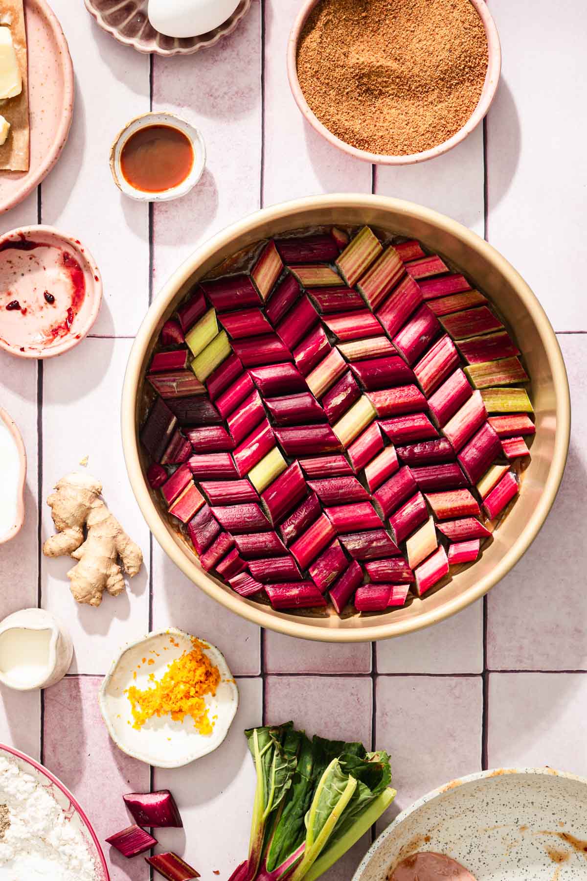 baking pan with rhubarb arranged on the bottom