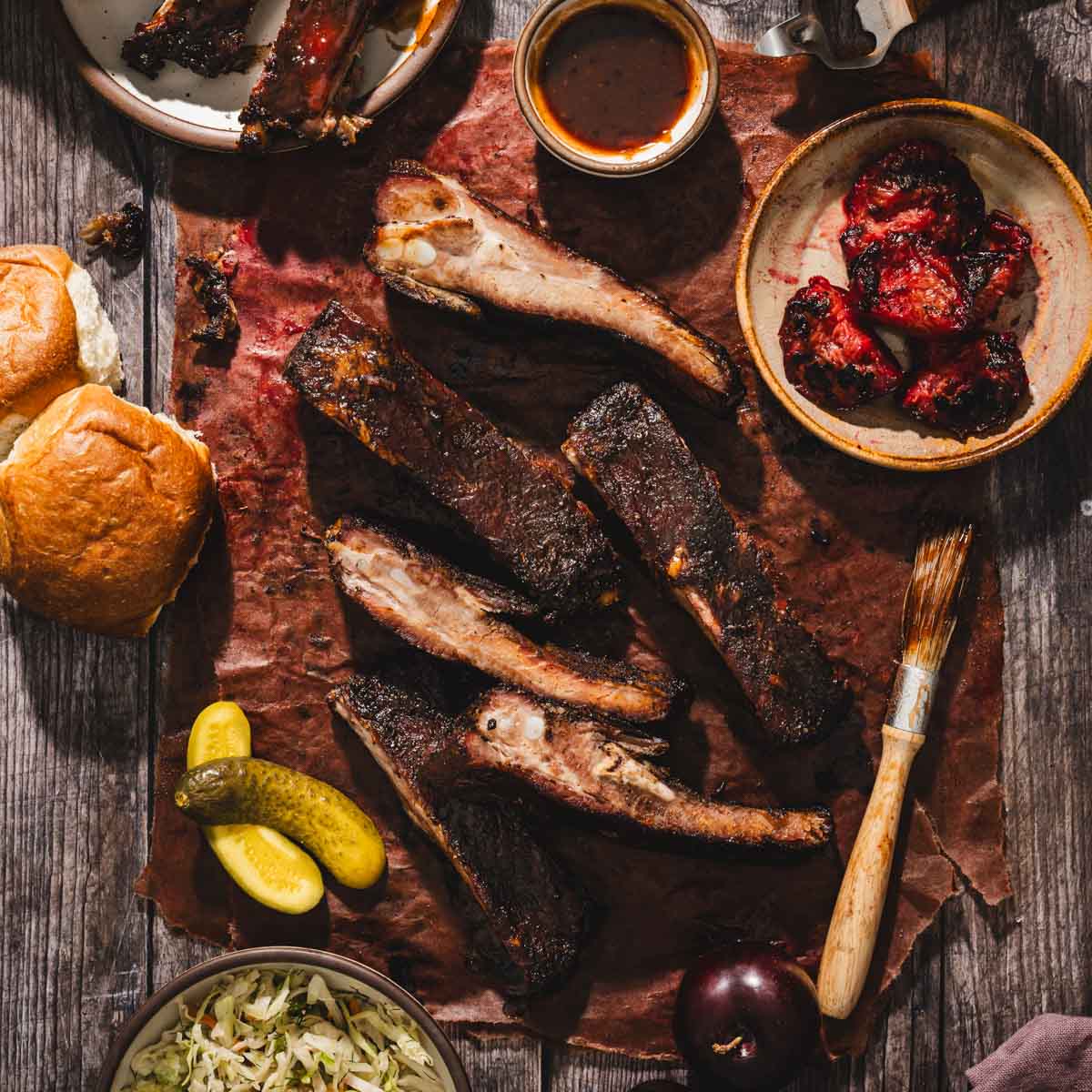 cut up smoked ribs on a butcher paper