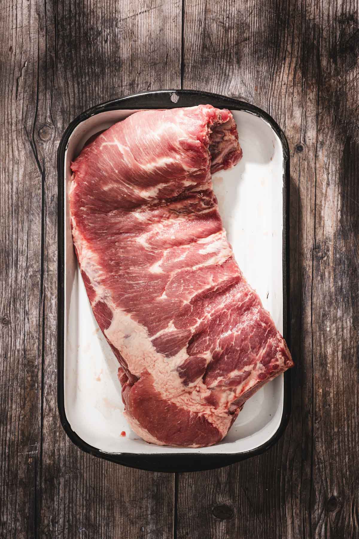 raw ribs on a serving tray