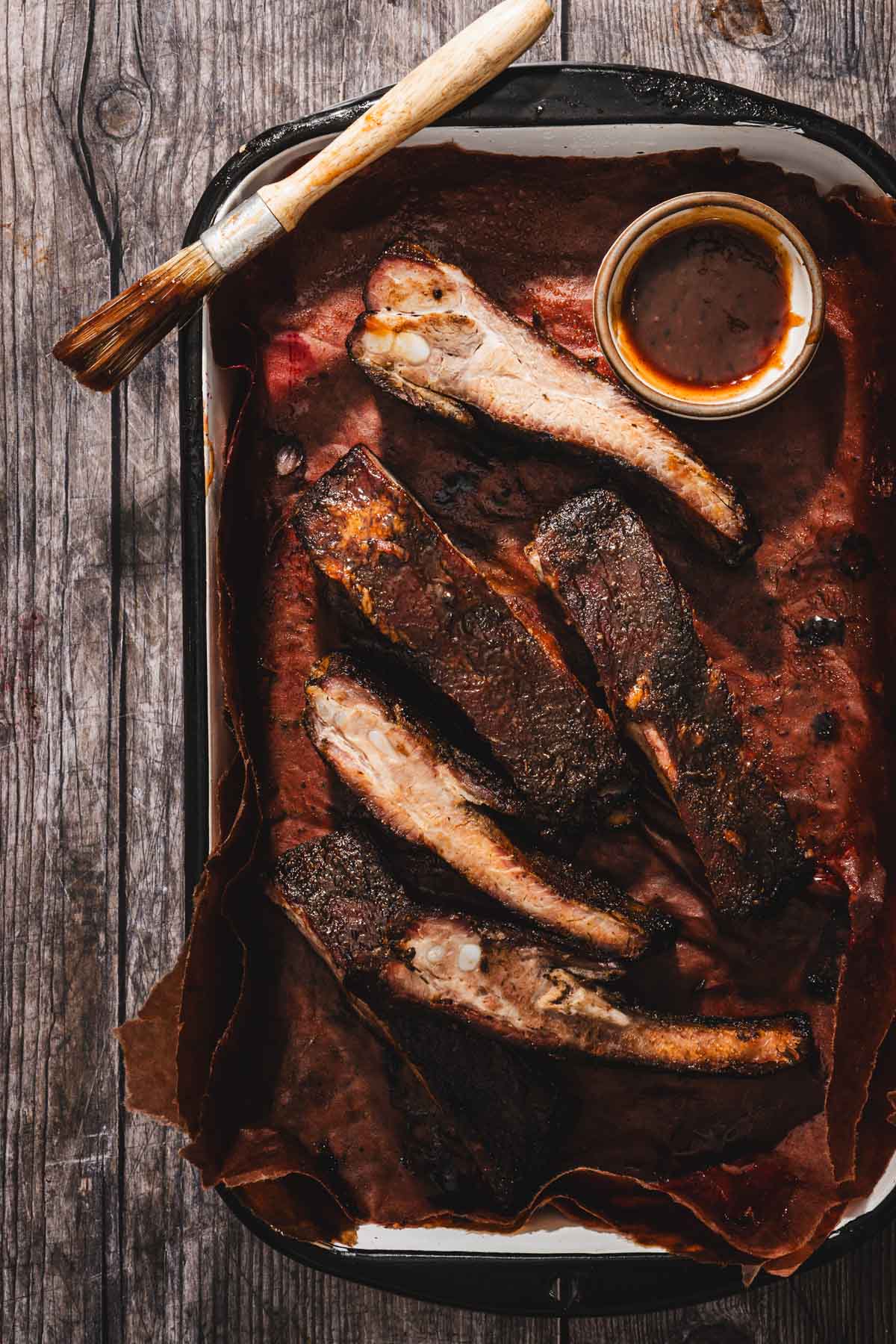 smoked cut up ribs on a serving tray