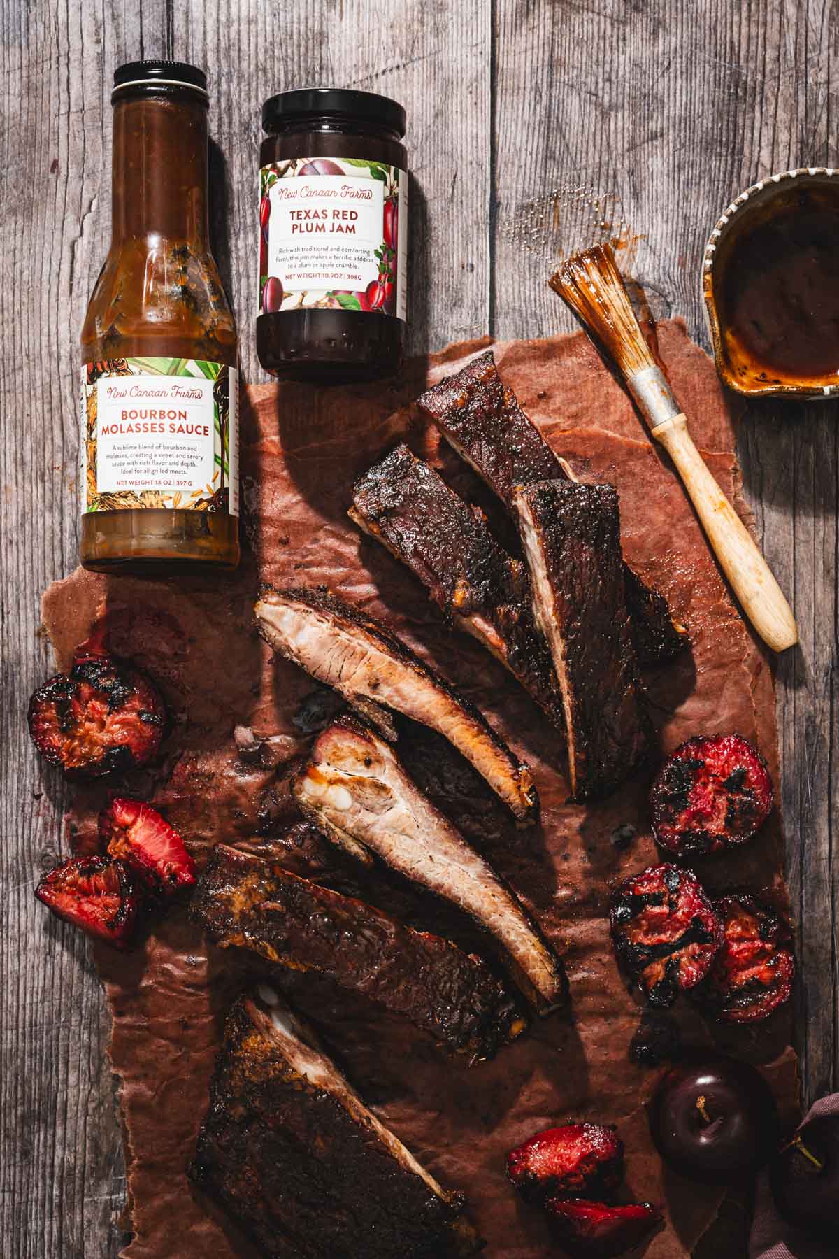 smoked cut up ribs on a butcher paper, brand jars