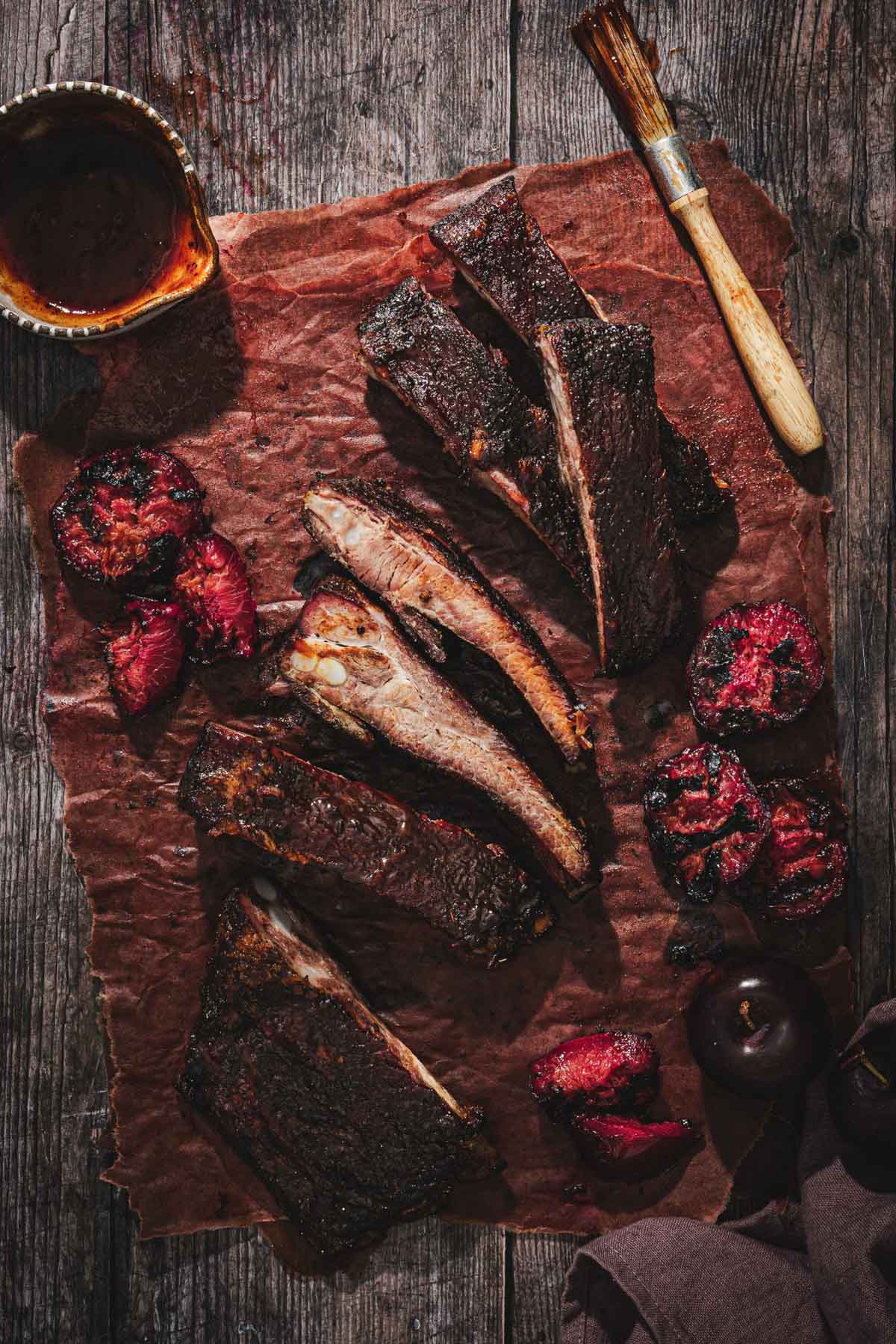 smoked ribs arranged on a butcher paper