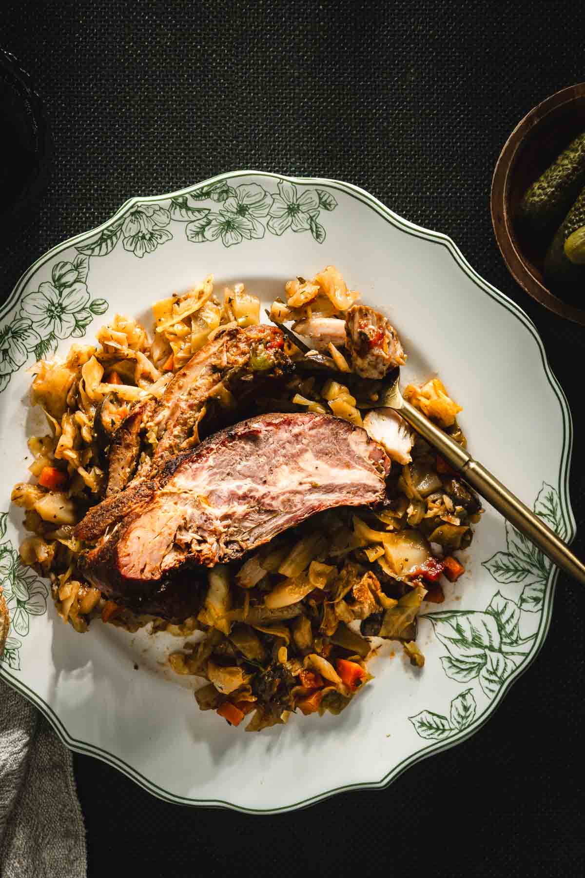 ribs and cabbage on a serving plate