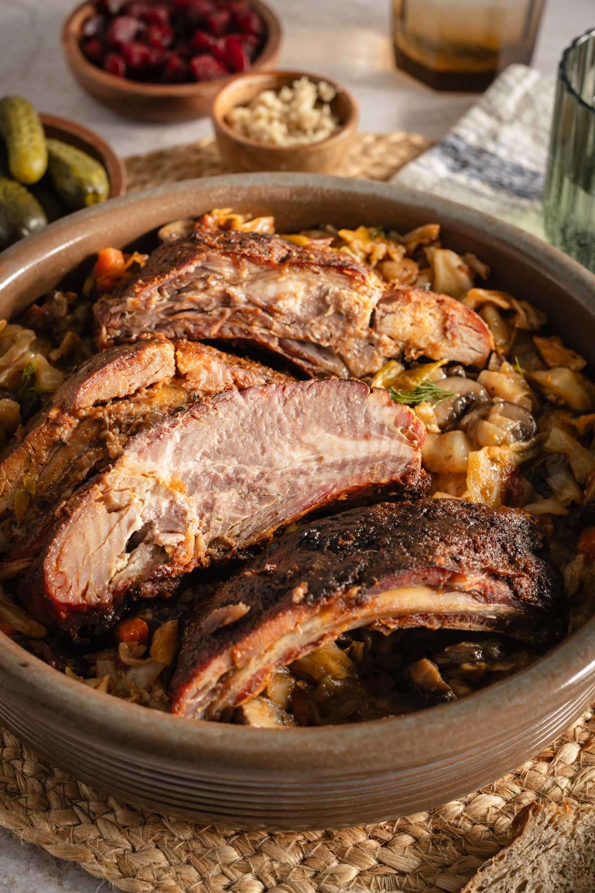 smoked ribs atop of cabbage dish