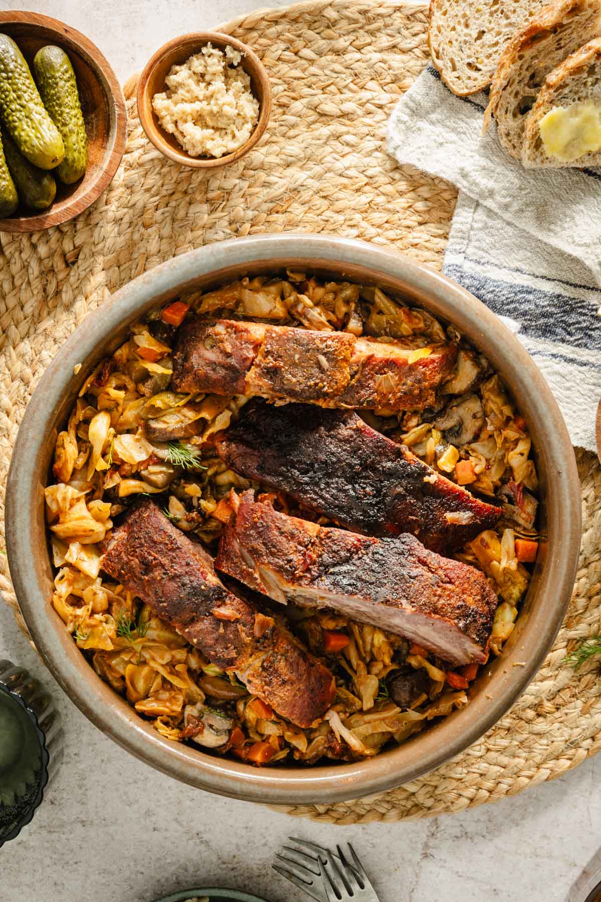 smoked ribs atop of cabbage dish