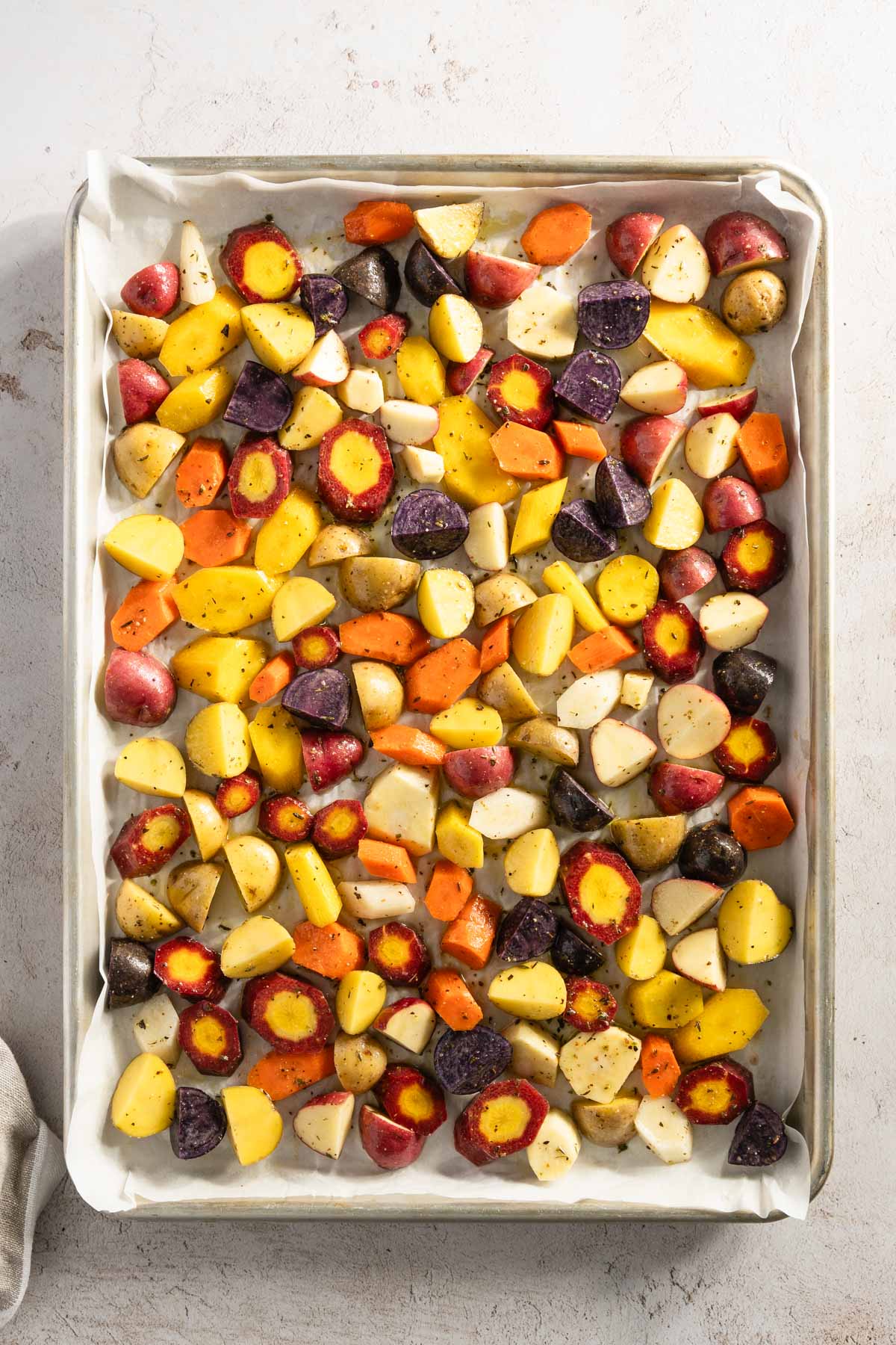 chopped veggies on a baking sheet