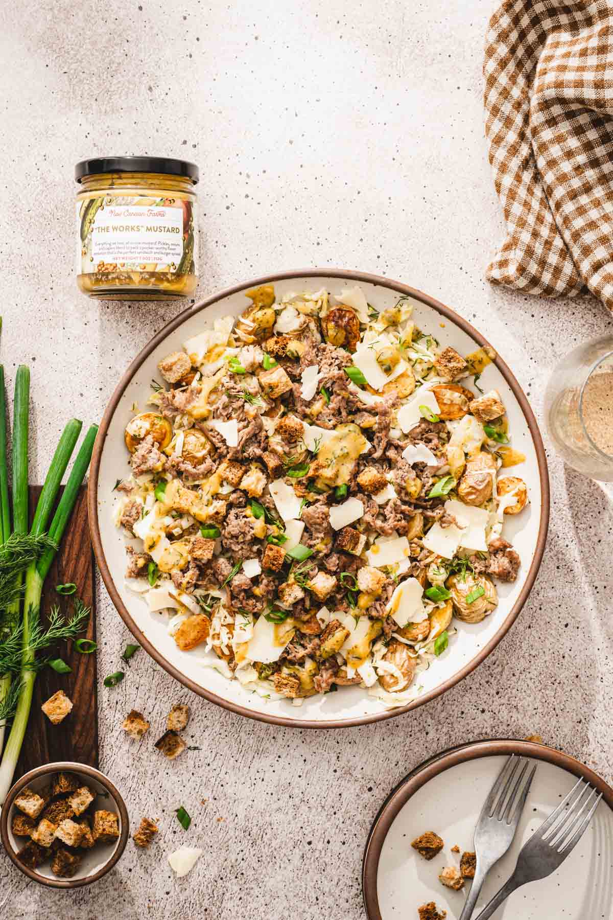 made slaad in a serving bowl, jar with mustard