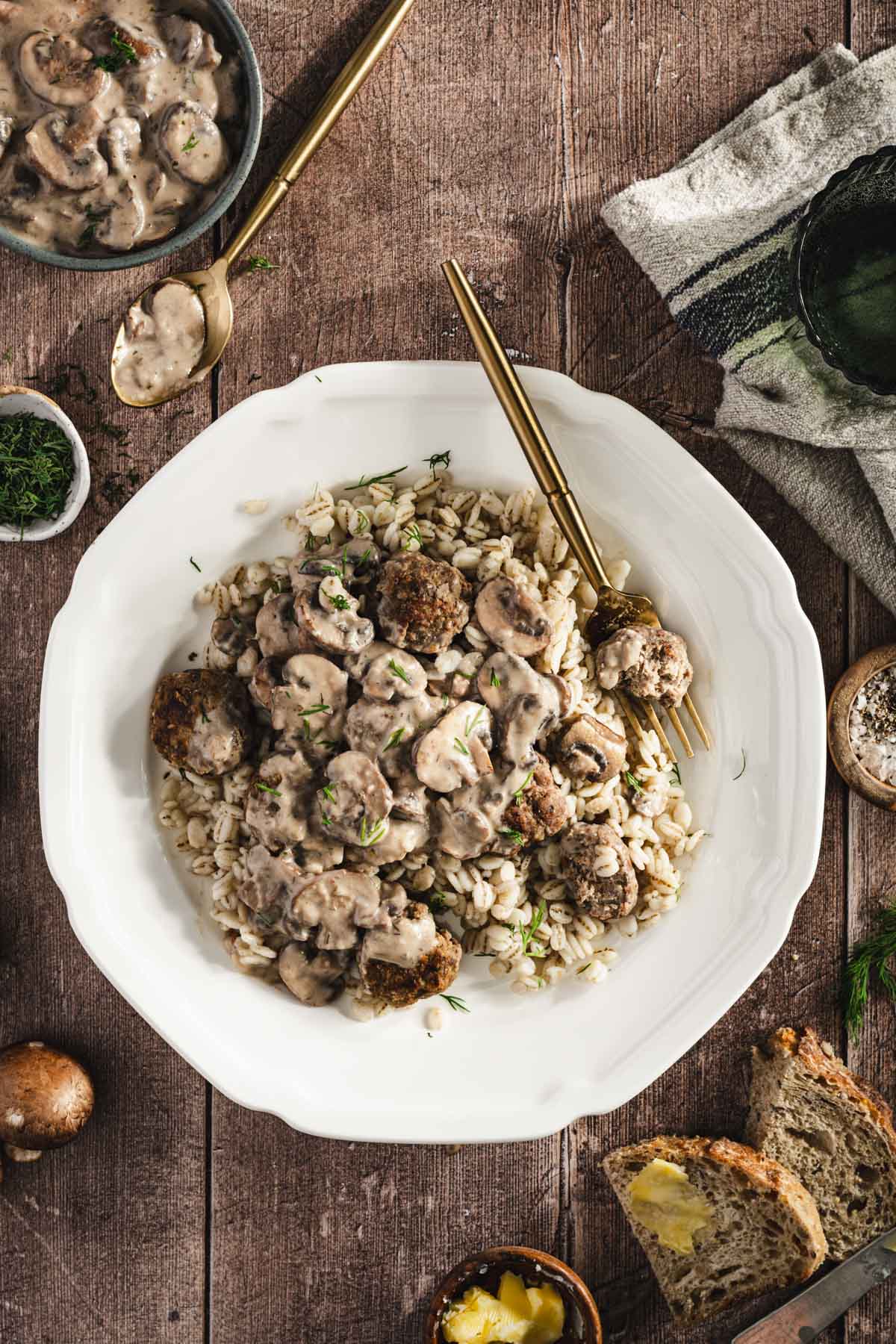 meatballs served with barley and mushroom sauce