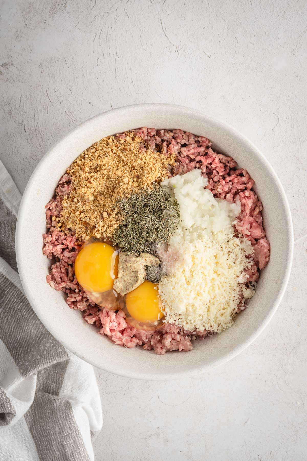 ingredients to make BBQ Meatballs, in one bowl, ready to mix