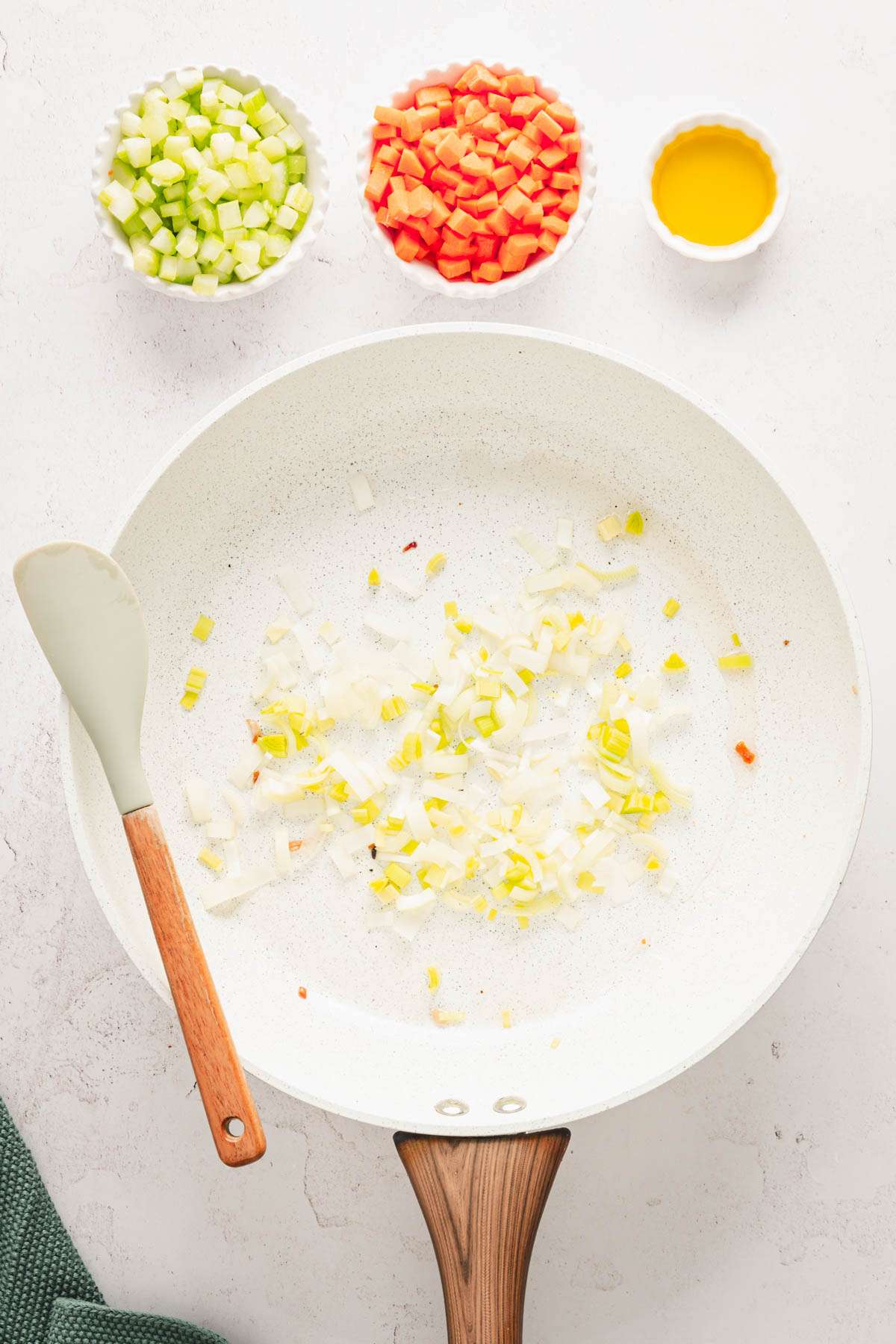 cook lees in a skillet, celery, carrots and oil in small dishe