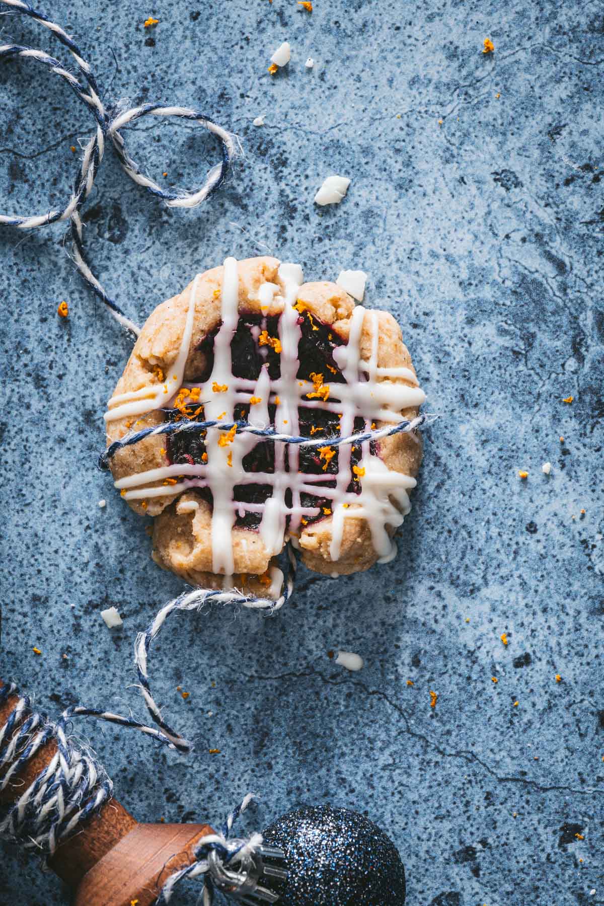 single cookie with blue thread