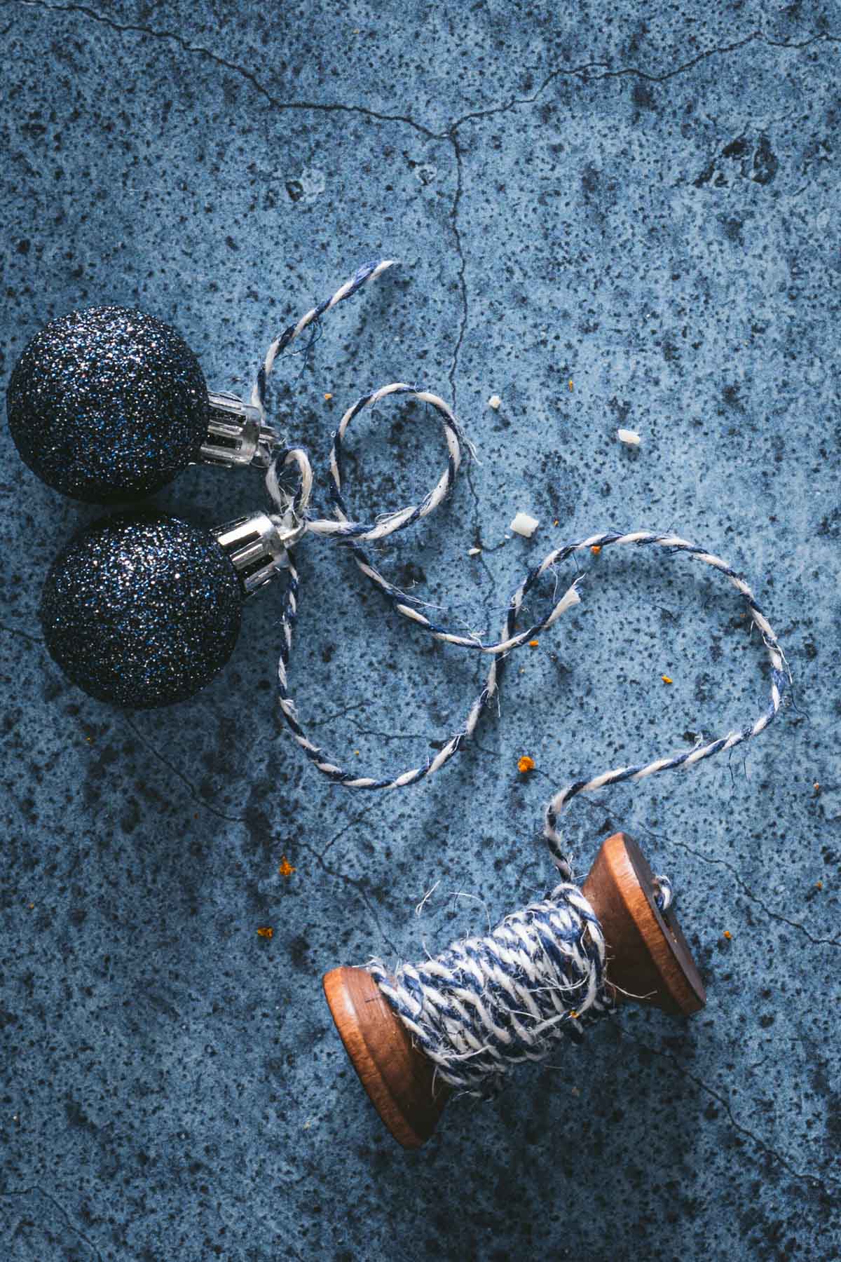 blue thread with christmas ornaments