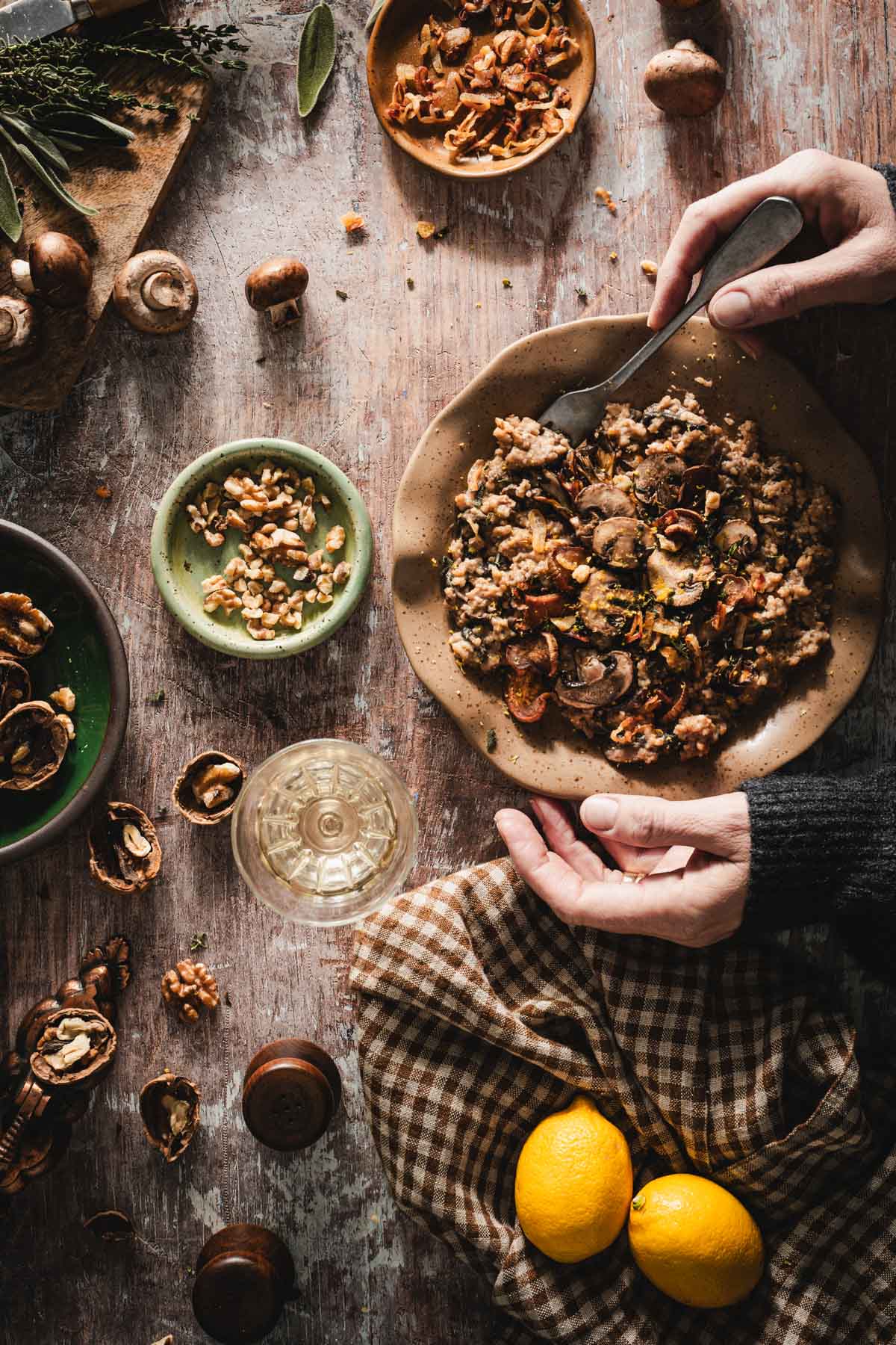 handsin frame eating risotto
