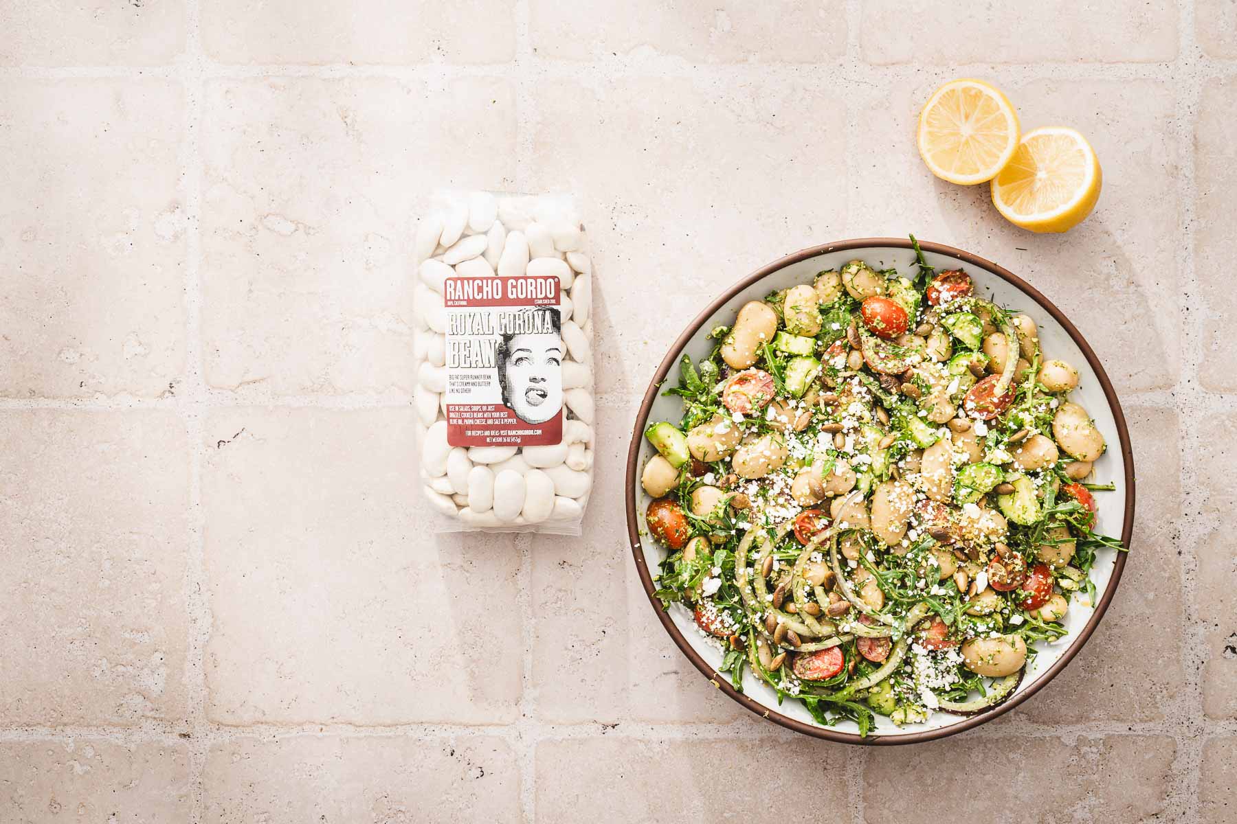 bowl with slad, bag with dry beans