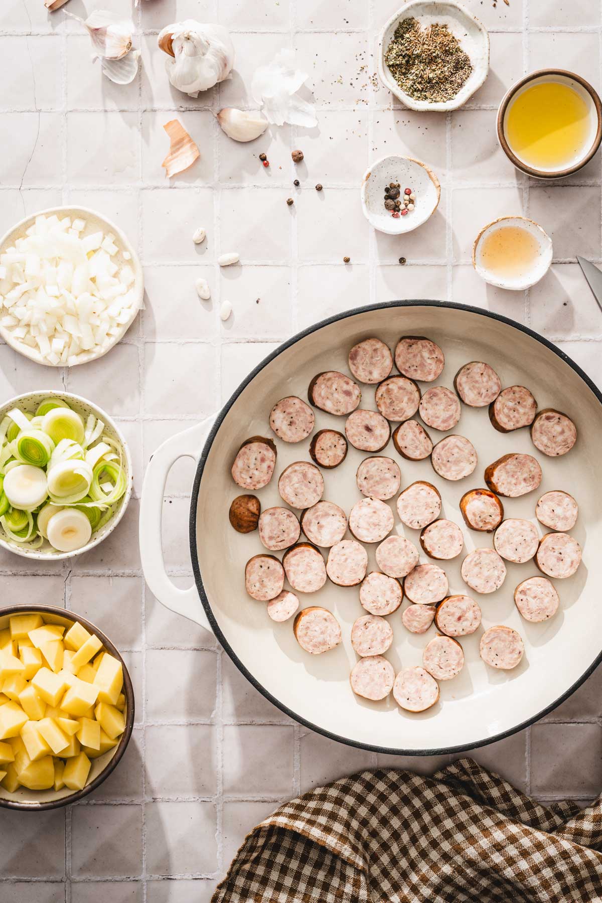 raw sausage in a pan