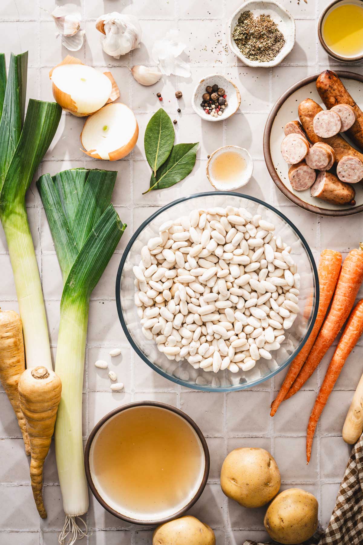 soaked beans in a glass bowl