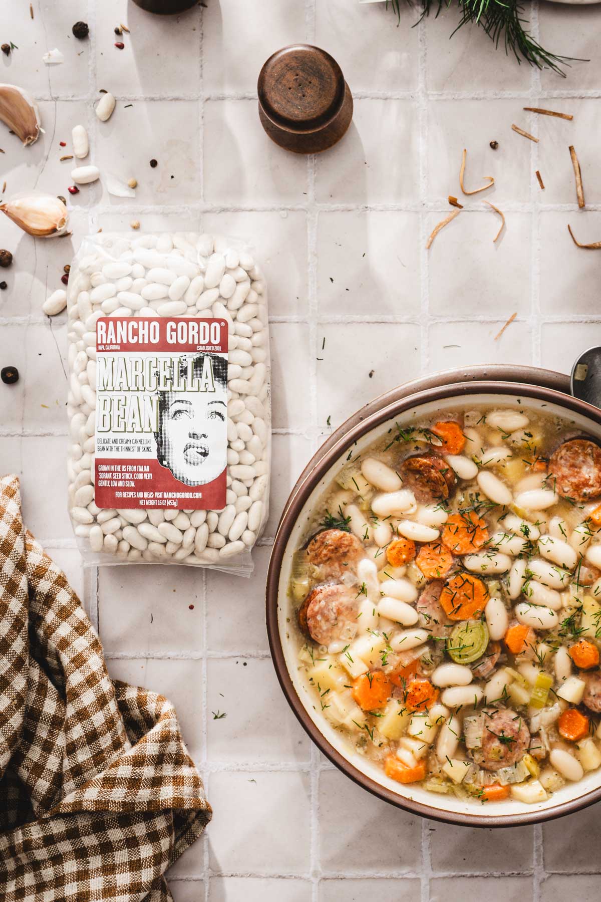 close up of a bowl with the soup, bag with dry beans