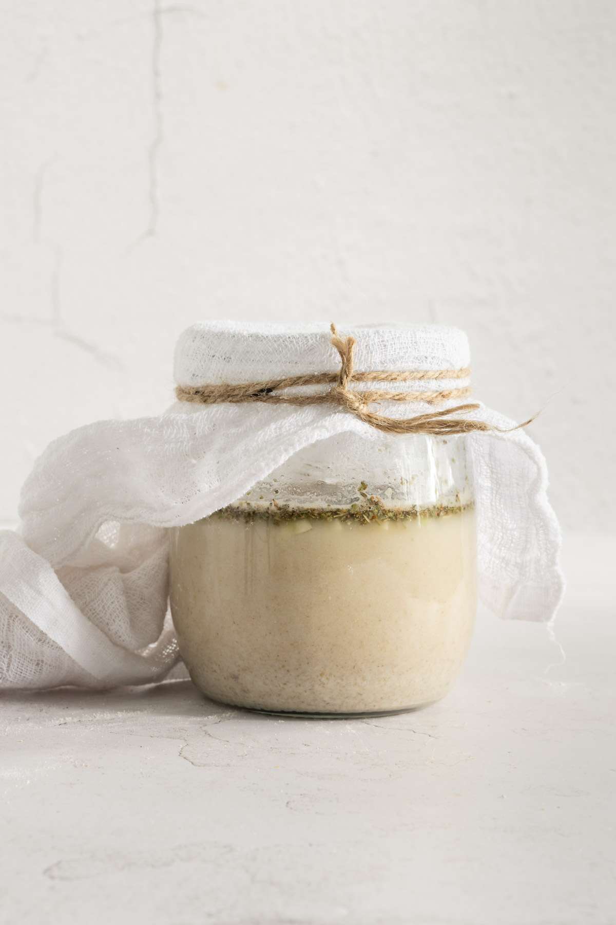 front view of jar with sour rye zakwas