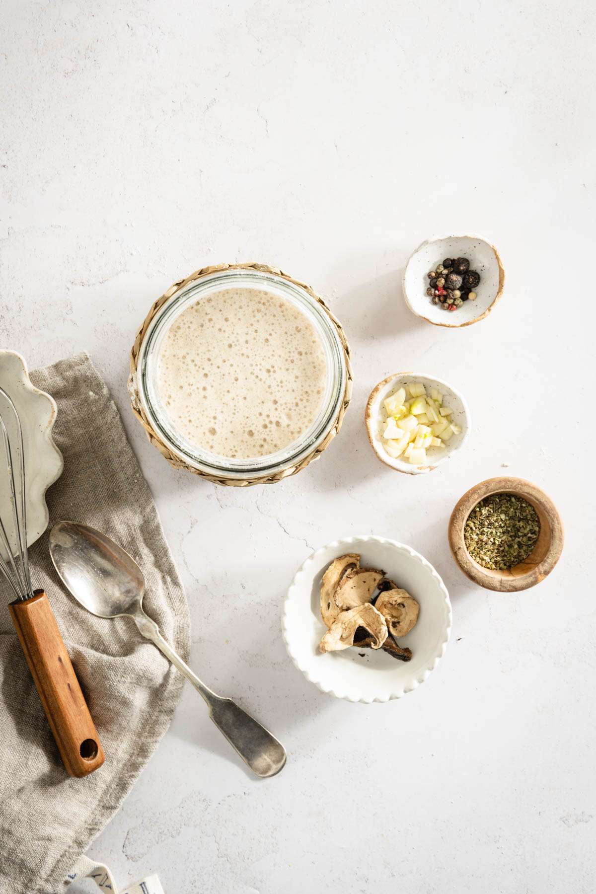 jar with water and flour and other ingredients to make sour rye zakwas